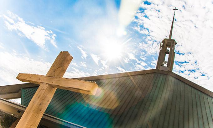 Wooden Cross on Bluff